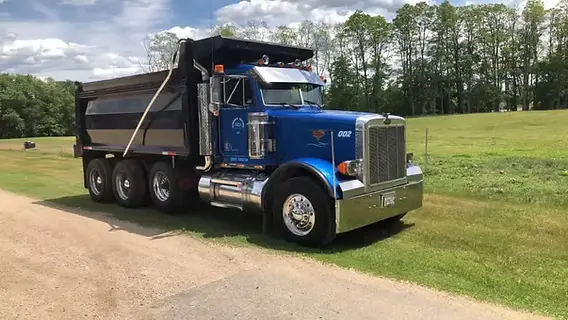 Dump truck on road — Dump Trucking Insurance from Truck Guard Insurance